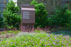 Sign For Internal Revenue Service: Sign marking the building of the Internal Revenue Service in Washington DC