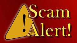 Alert Sign with Scam Alert warning text.