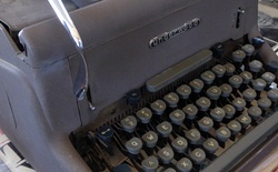 Close up of old typewriter complete with the ribbon