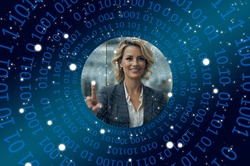 Businesswoman in front of touchscreen