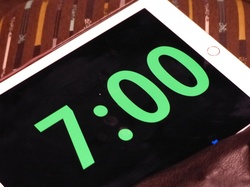 Digital timing device with green LED numbers showing 700