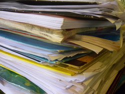 A stack of papers and books