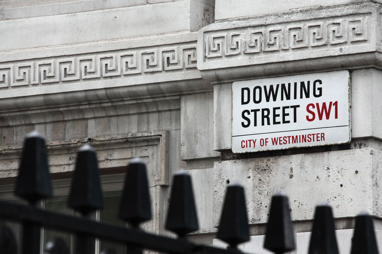 Downing street sign in London. A street where british prime minister lives.