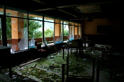 Abandoned mountainside restaurant interior