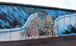 Artwork at the East side gallery on the Berlin wall, Germany.