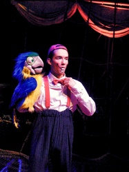 Circus Vargaus Clown with a make-believe parrot