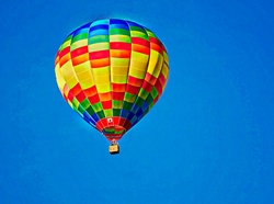 Painting of a hot air balloon against a clear blue sky