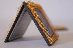 Two CPUs, one pyramid. Another CPU in background.