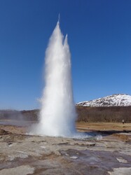 A clear sunny day, showing geyser