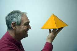 Man holding a pyramid