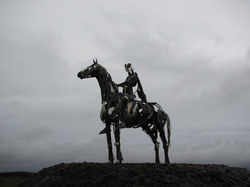 Metal framework sculpture of a Gaelic Chieftain on Lough Arrow, Ireland