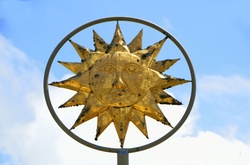 Sun God Symbol with blue sky background