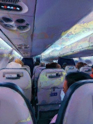 Artistic rendering of a full plane of masked passengers