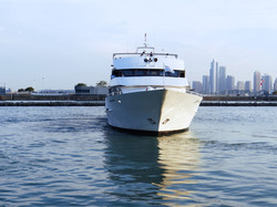 Dinner Cruise Ship leaving the dock on a weekend night in downtown Chicago.