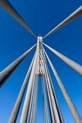 Cable stayed bridge detail against blue sky