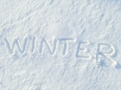 A word winter written in clean white snow