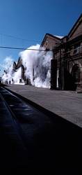 Old train workshop area train tracks and holding buildings with steam