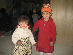 Two Iraqi children at the volunteer clinic in Baghdad