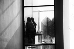 Behind the glass