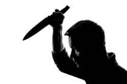 Horror Silhouette Of Man With Knife