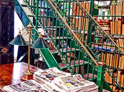 Library storage room with papers, books and vintage stairway - artistic