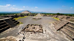 Aztec Avenue of the Dead stretches out before pyramids and shops of Mexico.
