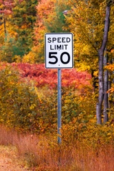 Speed limit sign in fall - fifty