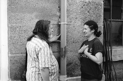 Richard Stallman and Kimiko Ishizaka discussing music. Photo by Julie Cotinaud.
