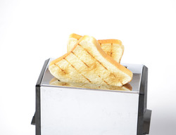 Toaster and slices of bread