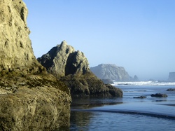 Huge rocks line the ocean in Brandon, Oregon