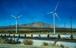 Trains and wind turbines in the California desert