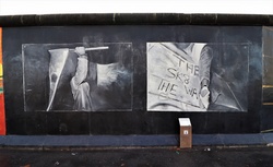 Artwork at the East side gallery on the Berlin wall, Germany.