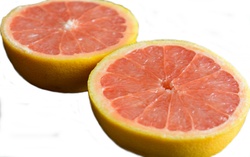 Isolated grapefruit sliced in half