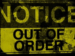 Grungy weathered out of order sign