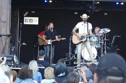 Canadian music band performing on a stage