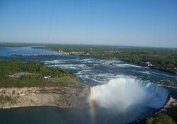 Picture taken of the Canadian Niagara Falls with a beautiful rainbow captured. 