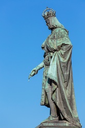 Statue of a king against blue sky in Prague