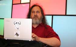 Richard Stallman at helm of his ever-present net book at a Bitcoin conference in London, September 2012.