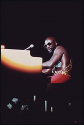 Black soul singer Isaac Hayes performs at the International Amphitheater in Chicago