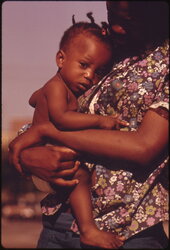A South Side Chicago ghetto mother and child who live in nearby low income housing...