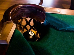 Billiard table, corner pocket and the eight ball