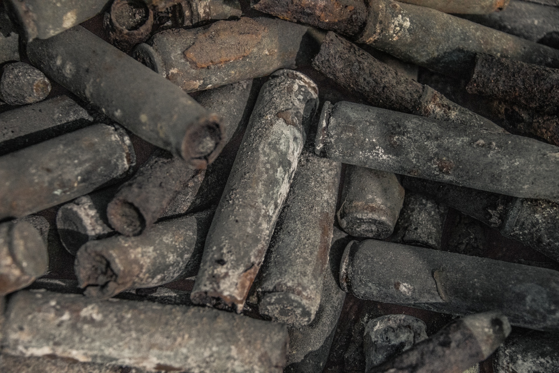 A pile of old rusty WWII shells