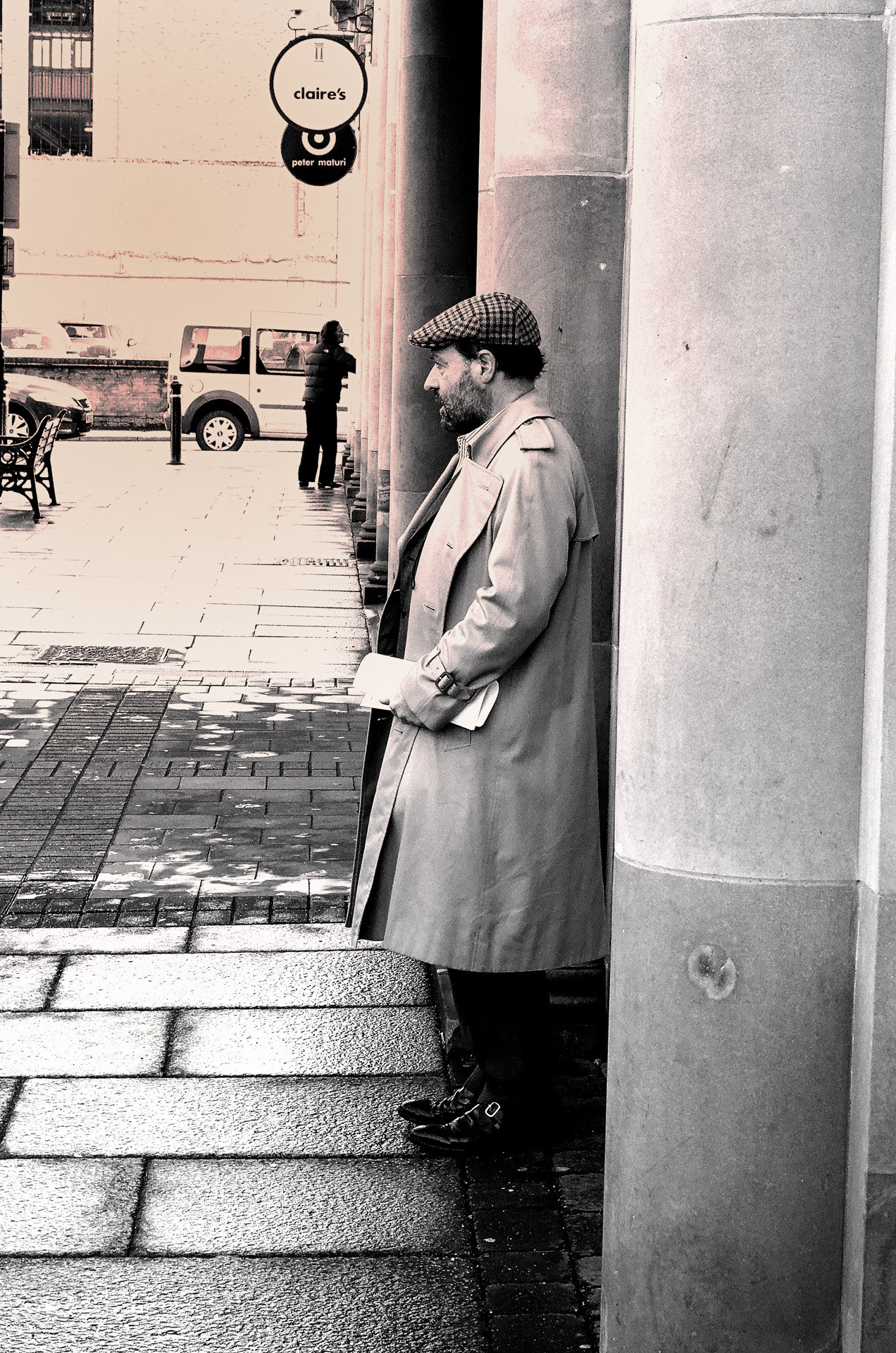 Gentleman with newspapers