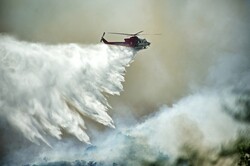 Helicopter Drops Water