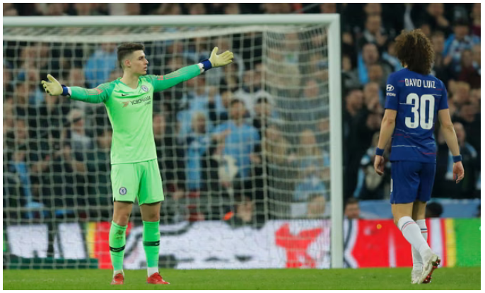 Kepa Arrizabalaga gestures to the Chelsea bench after refusing to be substituted