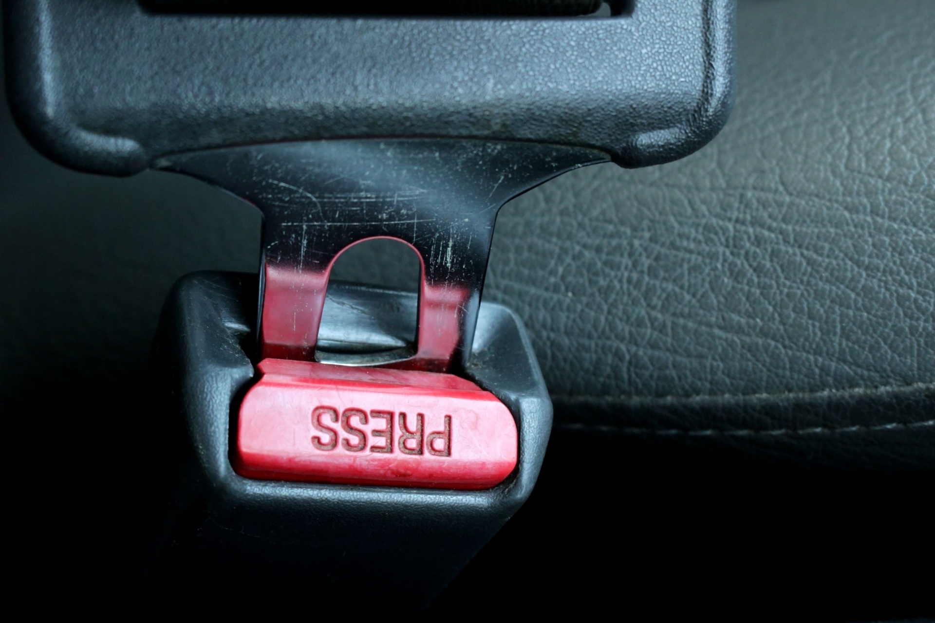 Fastening a Car Seatbelt into the Latch