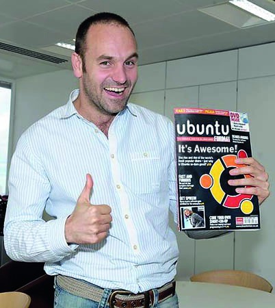 Mark Shuttleworth with magazine