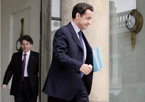 Sarkozy with Breton behind