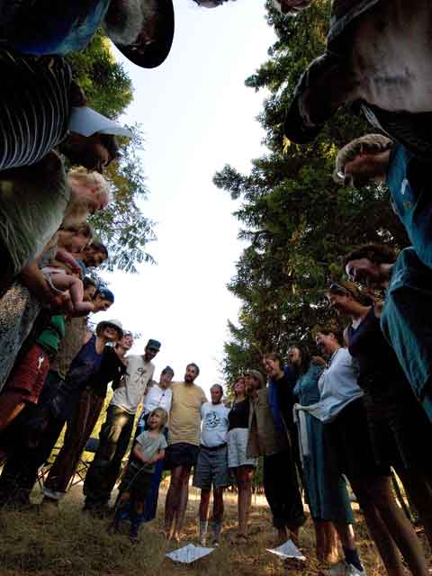 Participants in Diana Leafe Christian's 'Heart of a Healthy Community' seminar circle during an afternoon session at O.U.R. Ecovillage