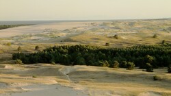 Beautiful sand dunes in Lithuania. Sun and shadows play. Horizontal format
